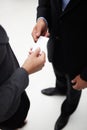 Businessman and woman exchanging a business card