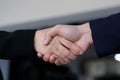 Businessman and woman handshake at office, business cooperation, success in business concept Royalty Free Stock Photo
