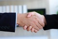 Businessman and woman handshake at office, business cooperation, success in business concept Royalty Free Stock Photo