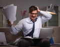 Businessman workaholic working late at home Royalty Free Stock Photo