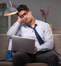 Businessman workaholic working late at home Royalty Free Stock Photo