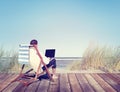 Businessman Working by the Beach