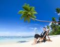 Businessman working on the Beach with Laptop Royalty Free Stock Photo