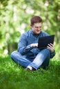 Businessman working in the city park. Royalty Free Stock Photo