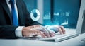 Businessman working on computer with data analysis charts and graphs Royalty Free Stock Photo