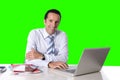 Businessman working on computer laptop sitting at office desk chroma key Royalty Free Stock Photo