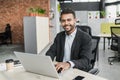 Businessman working on computer. Men using laptop in the office. Internet marketing, finance, business concept Royalty Free Stock Photo