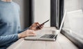 Businessman working on computer. Men using smart phone and laptop in the office. Royalty Free Stock Photo