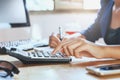 businessman working on desk office using calculator business fin