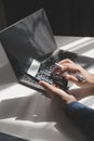 businessman working on desk office with using a calculator to calculate the numbers, finance accounting concept Royalty Free Stock Photo