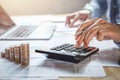 businessman working on desk with using calculator for calculate finance and accounting Royalty Free Stock Photo