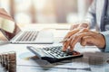 businessman working on desk with using calculator for calculate finance and accounting Royalty Free Stock Photo