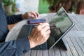 Businessman working on his tablet by using his stylus pen Royalty Free Stock Photo