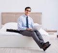 Businessman working in hotel room Royalty Free Stock Photo