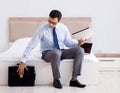 Businessman working in hotel room Royalty Free Stock Photo