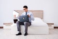 The businessman working in hotel room Royalty Free Stock Photo