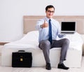 Businessman working in hotel room Royalty Free Stock Photo