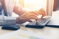 Businessman working on keyboard and mouse computer man sitting on the table and using internet technology at workplace in office Royalty Free Stock Photo