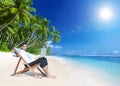 Businessman Working with Laptop on Beach Royalty Free Stock Photo