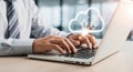 Businessman working on laptop with cloud computing icon Royalty Free Stock Photo