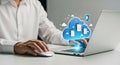 Businessman working on laptop with cloud computing technology for data storage and network Royalty Free Stock Photo
