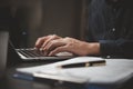 Businessman working laptop computer hand typing keyboard computer office technology communication internet on desk Royalty Free Stock Photo