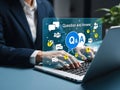 Businessman working on laptop with digital Q&A hologram interface for customer support and FAQ. Royalty Free Stock Photo