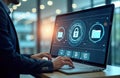 Businessman working on laptop. Modern office environment. Focus on digital security software. Managing corporate files, data. Royalty Free Stock Photo