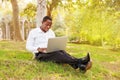 Businessman working on laptop outdoors Royalty Free Stock Photo