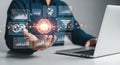 Businessman working with laptop and virtual screen showing AI brain and data analysis Royalty Free Stock Photo
