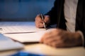 Businessman working late signing a document or contract Royalty Free Stock Photo