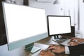A businessman is working on a mock-up. Using a laptop with a blank copy space screen for your advertising text message computer