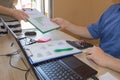 Businessman working on office desk with Calculator, a computer, a pen and document. Man, counting money Royalty Free Stock Photo