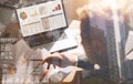 Businessman working at office on laptop.Man holding paper documents in hands.Concept of digital screen,virtual Royalty Free Stock Photo