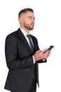 Businessman working with smartphone in hands. Isolated over white background