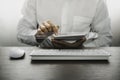 Businessman working with tablet, mouse, keyboard computer device on office desk. Royalty Free Stock Photo