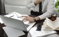 Businessman working in workplace.Stylish man in shirt and tie.