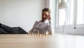 Businessman with worried expression sitting at his office desk Royalty Free Stock Photo