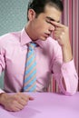 Businessman worried headache stressed and sad Royalty Free Stock Photo