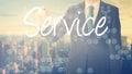 businessman writes on board text: Service - with sunset over the