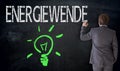 Businessman writes Energiewende in german energy revolution Royalty Free Stock Photo