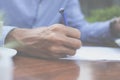 Businessman writing document. Royalty Free Stock Photo