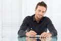 Businessman Writing Document Royalty Free Stock Photo