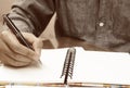 Businessman writing form filling with register on paper notebook Royalty Free Stock Photo