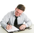 Businessman Writing on Legal Pad Royalty Free Stock Photo