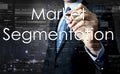 Businessman writing Market Segmentation on virtual screen Royalty Free Stock Photo