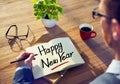 Businessman Writing the Words Happy New Year Royalty Free Stock Photo