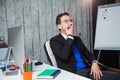 Businessman yawning at office boring job concept. Royalty Free Stock Photo