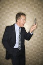 Businessman Yelling at Cell Phone Royalty Free Stock Photo