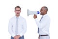 Businessman yelling with a megaphone at his colleague Royalty Free Stock Photo